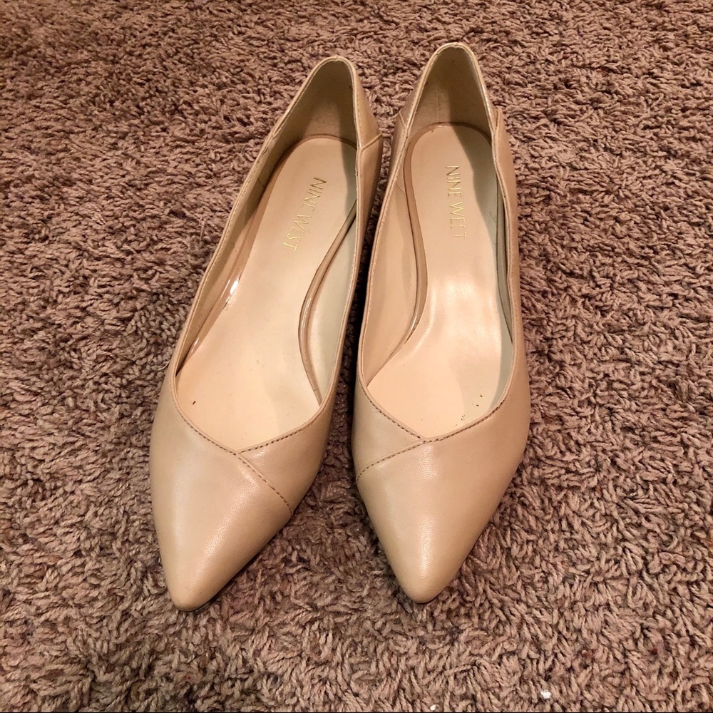 Nine West nude wedge pumps.